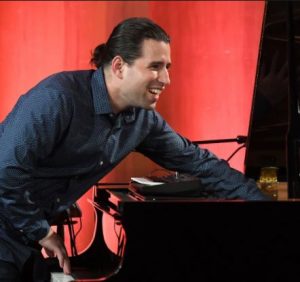 Alfredo Rodriguez playing at piano