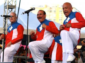 El Gran Combo Salsa singers Jerry Rivas, Charlie Aponte, and Papo Rosario