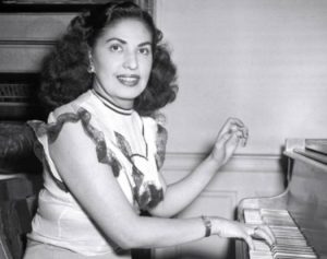 Bolero songwriter Consuelo Velazquez at piano