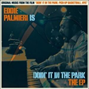 Eddie Palmieri at piano in "Doin' it in the Park" cover art