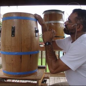 Puerto Rican artisan making barril de Bomba.
