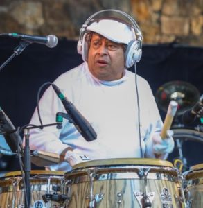 Giovanni Hidalgo playing congas Planet Drum